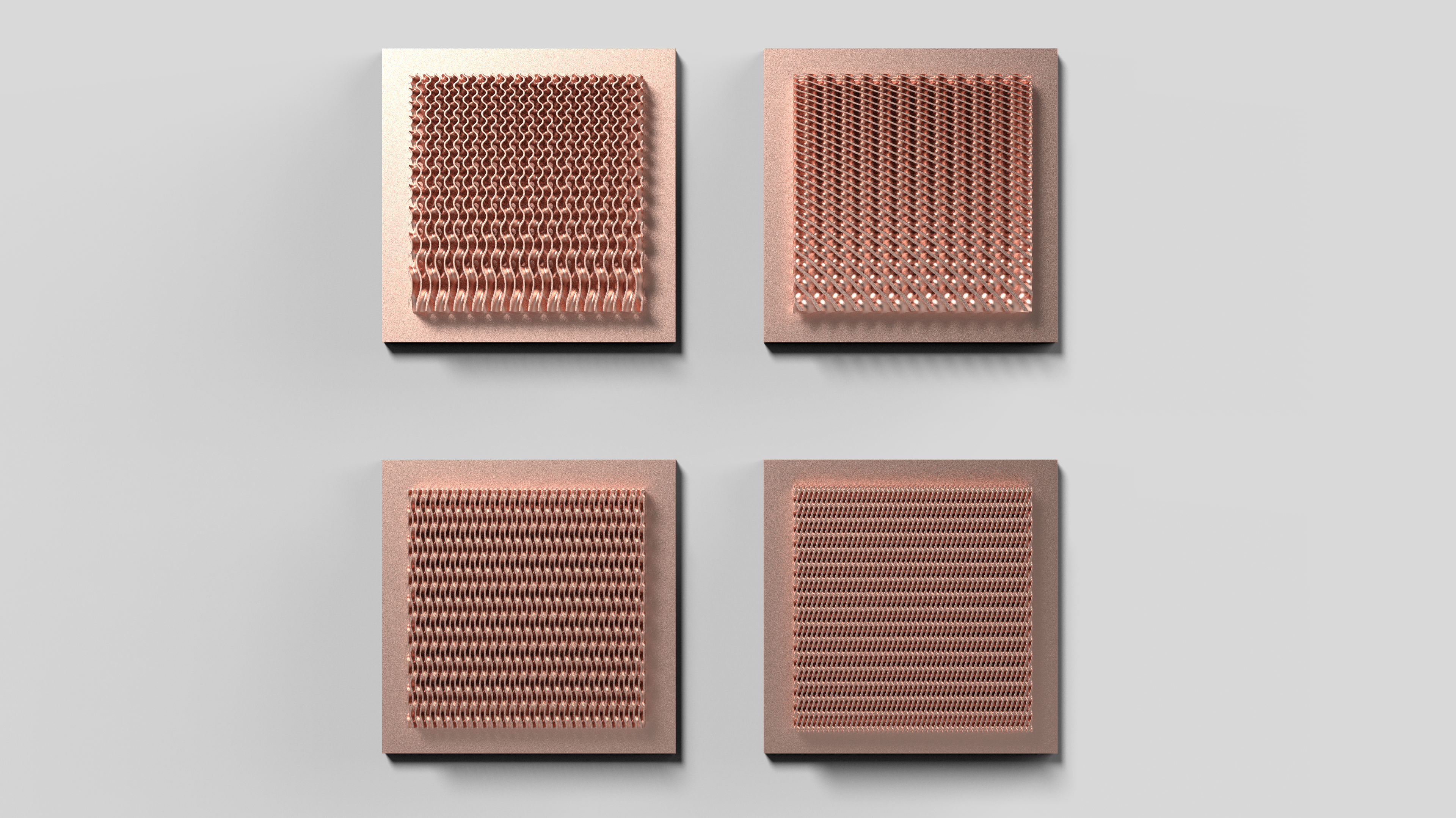 Four copper additive thermal fin geometry samples arranged in a 2x2 set